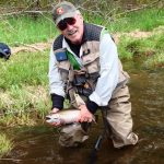 Author and Guide Tom Welch prepares to release this 18-inch beauty, caught on a wet hare's ear fly on the Magalloway. 